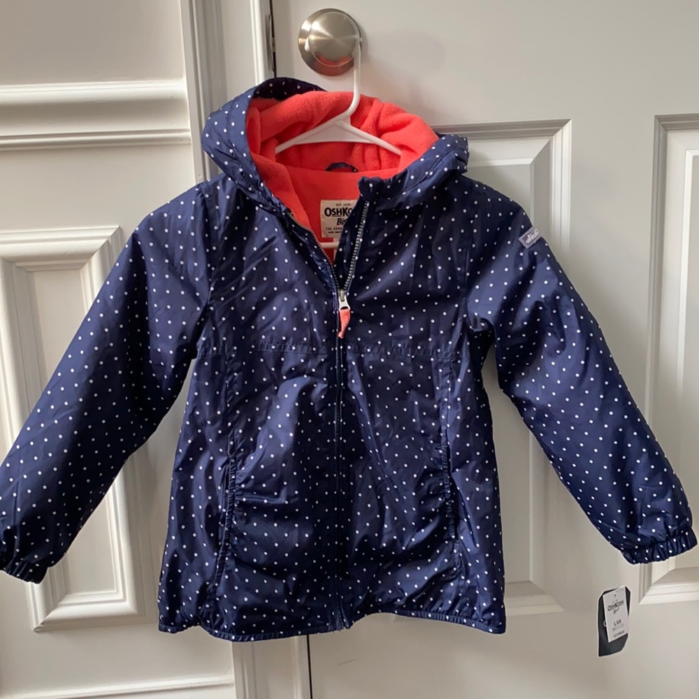 New with tags navy Oshkosh rain jacket, fleece lined size L/6x